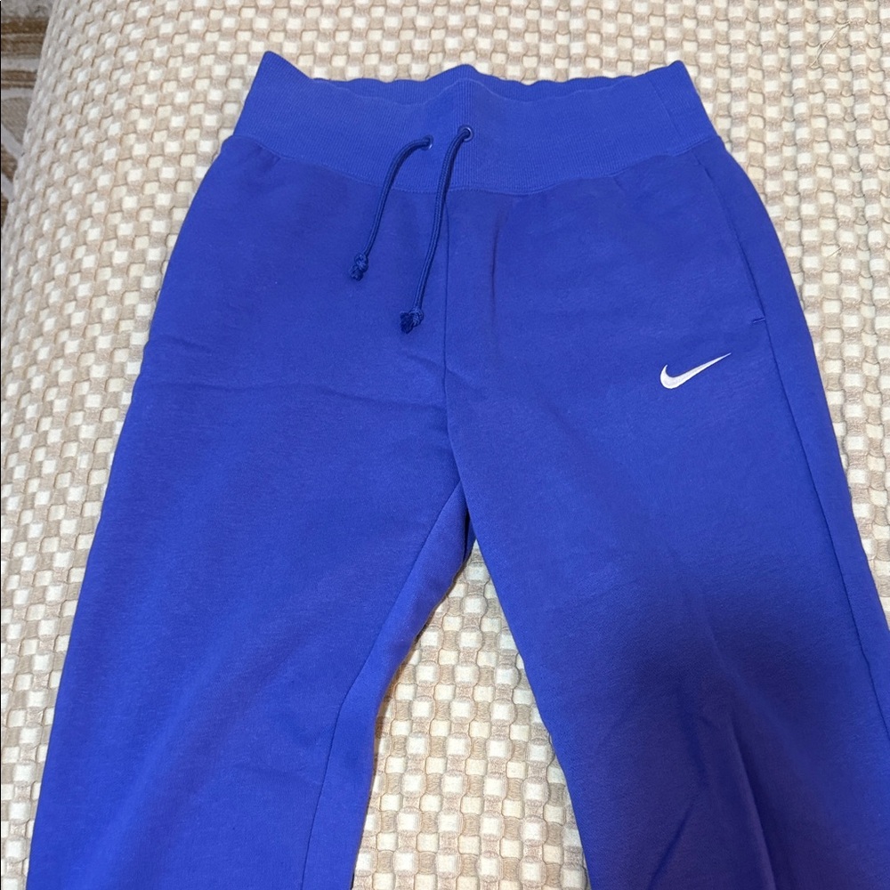 Nike women Blue Joggers with White Swoosh